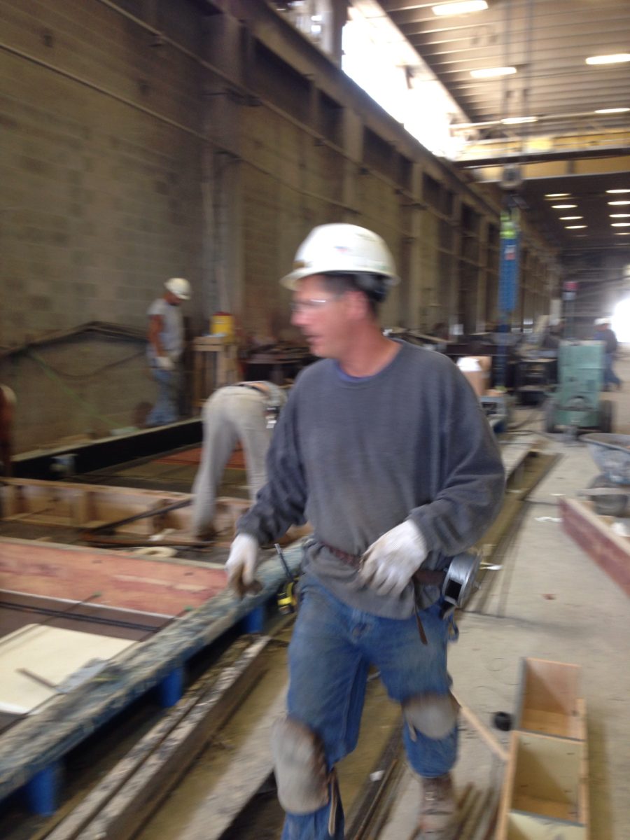 Engineer inspecting reinforcement on site